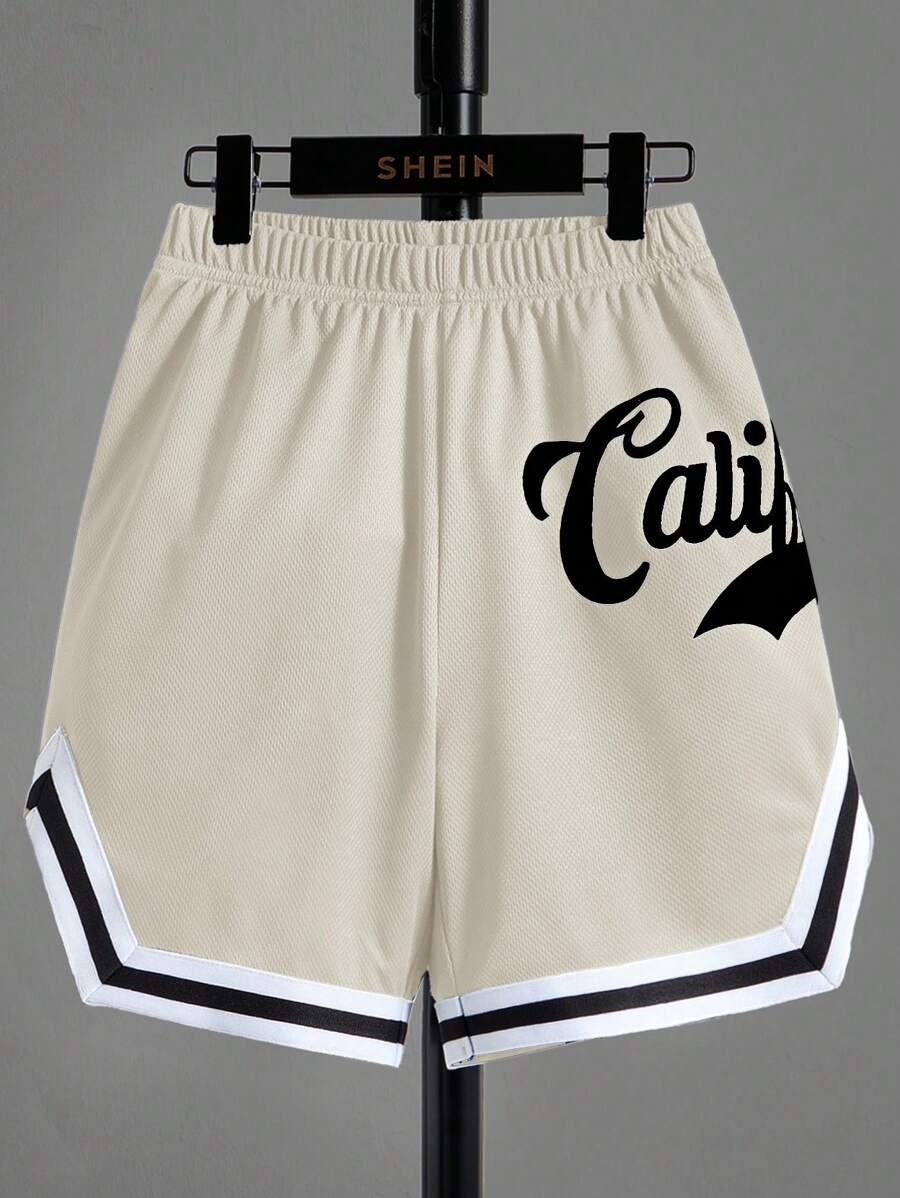 SHEIN Pantalones cortos deportivos de punto con diseño de patrón deportivo con ajuste holgado para niño preadolescente, pantalones cortos de baloncesto