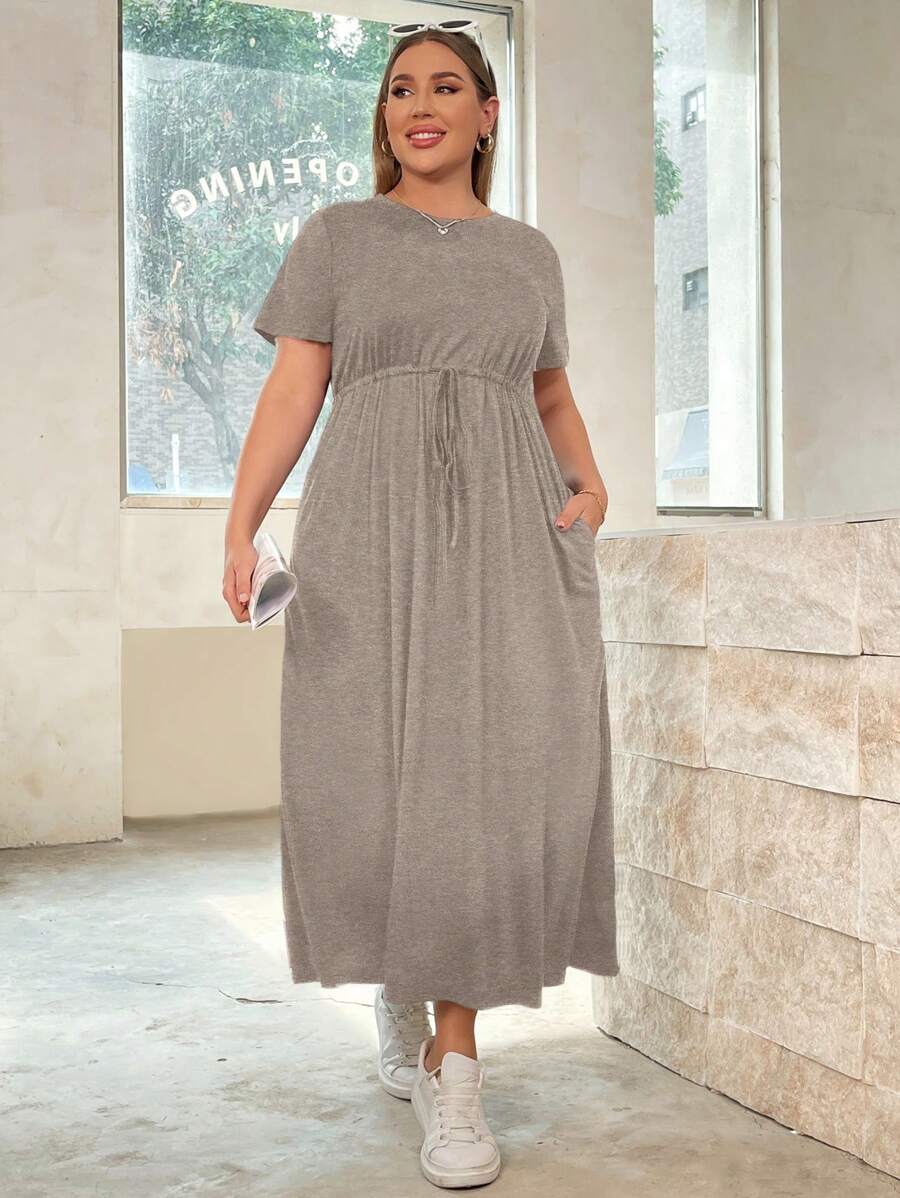 SHEIN Essnce Vestido de manga corta largo con tiras en la cintura y bolsillos, de unicolor de moda casual de verano para mujer de talla grande