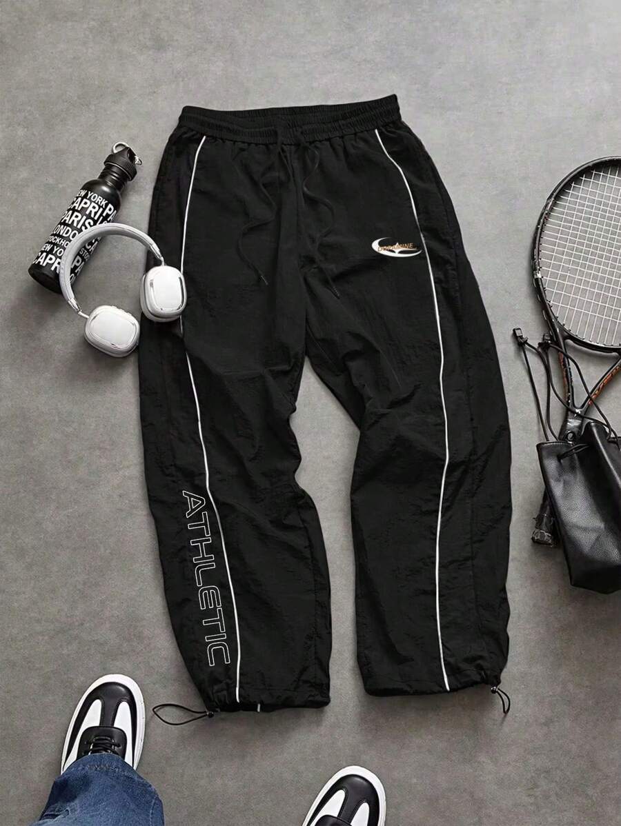 Manfinity Sport Corelite Men's Letter Print Drawstring Waist Loose Fit Casual Sweatpants Fall Breathable Sweat-Wicking Lightweight Comfortable Wide Leg Minimalist Design Slim Fit For Workout Gymwear