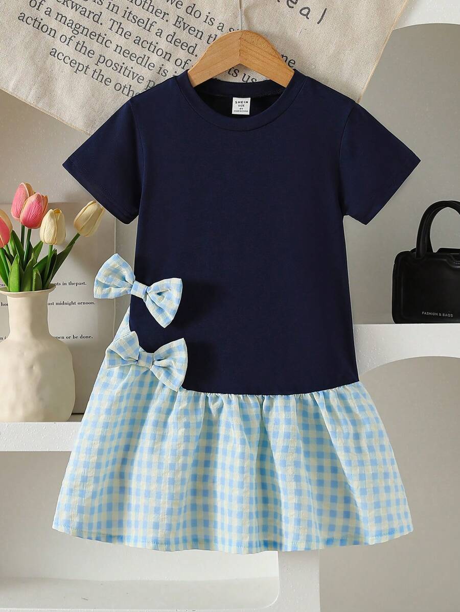 Jong meisje marineblauwe gebreide patchwork geruite jurk met schattige strikdecoratie, frisse stijl casual vakantie mode jurk voor meisjes