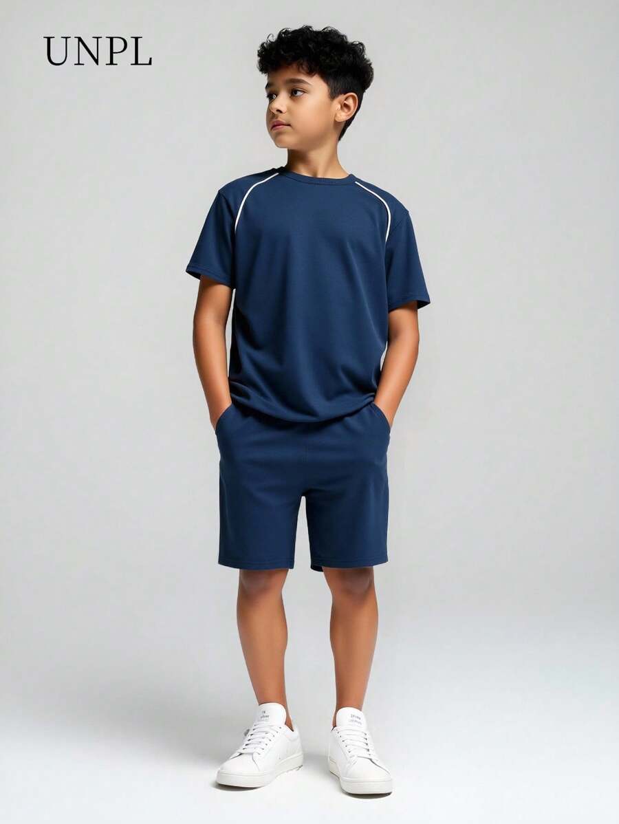SHEIN Conjunto de pantalones cortos de verano de 2025 con cuello redondo y manga corta, cómodo atuendo de uso diario para niños