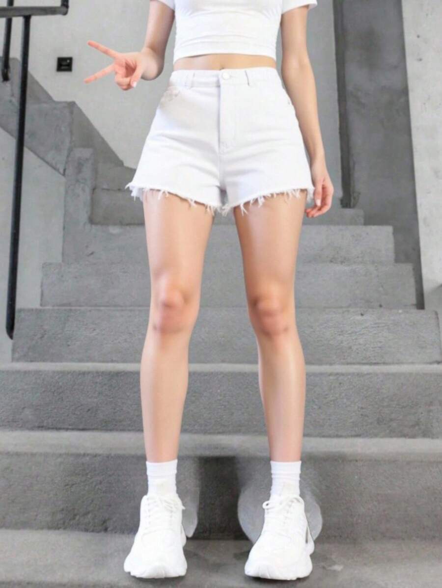 SHEIN Pantalones cortos casuales de mezclilla lavada con dobladillo deshilachado para niñas preadolescentes