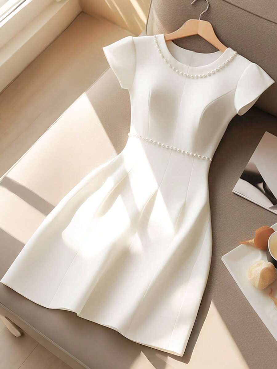 GlowEve Vestido midi elegante para reuniones para mujer, sin mangas con decoración de perlas en la cintura, primavera y verano