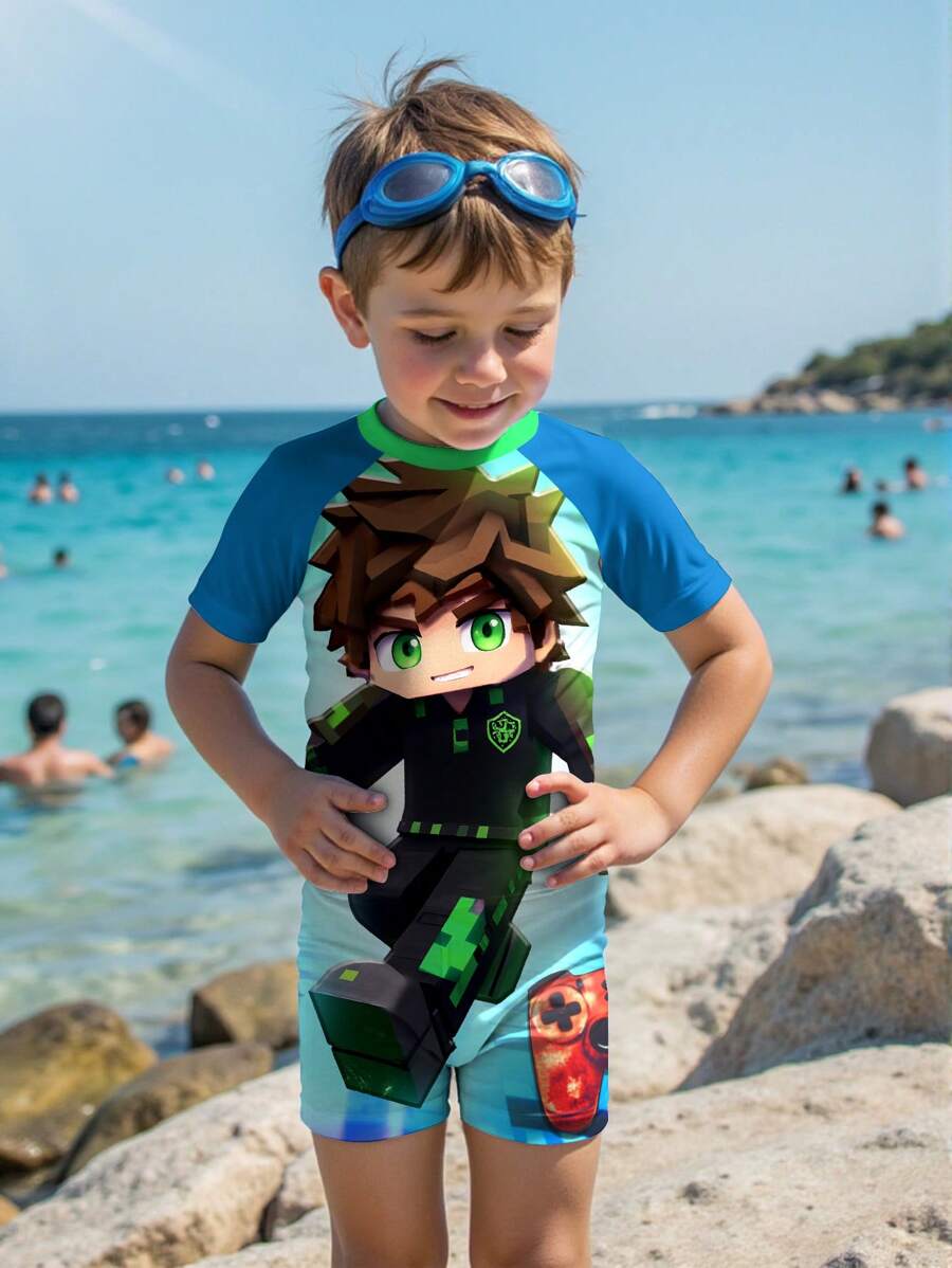 Conjunto de traje de baño informal para niño con camiseta de manga corta de cuello redondo con estampado de dibujos animados y pantalones cortos, apto para el verano