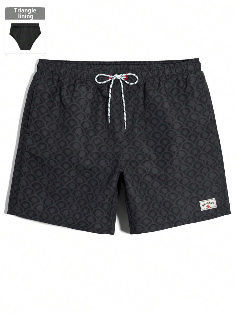 Manfinity Swimmode Short de plage ample avec cordon de serrage à la taille et imprimé lettrage pour hommes grandes tailles