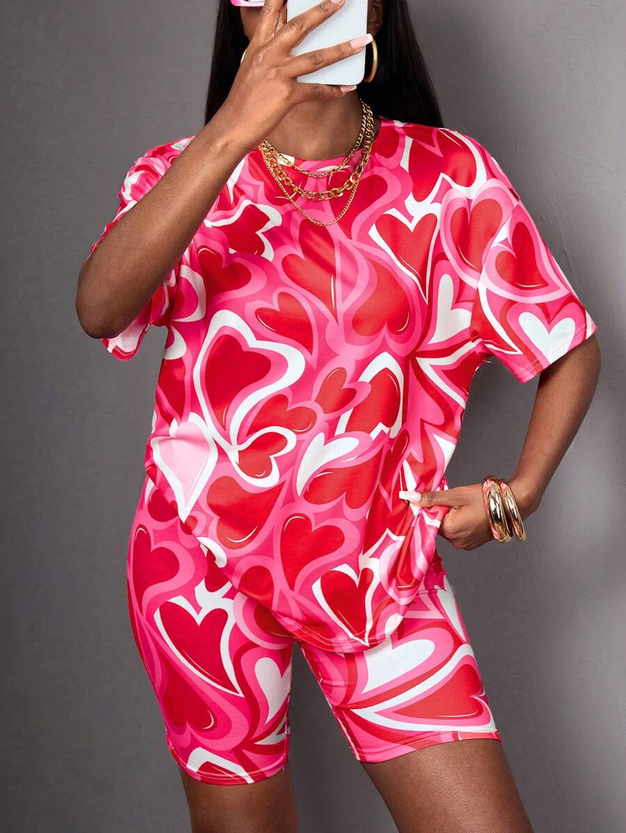 SHEIN Completo sportivo da ragazza con maglietta a maniche corte con grafica cuore e pantaloncini, tie-dye, adatto per la primavera/estate