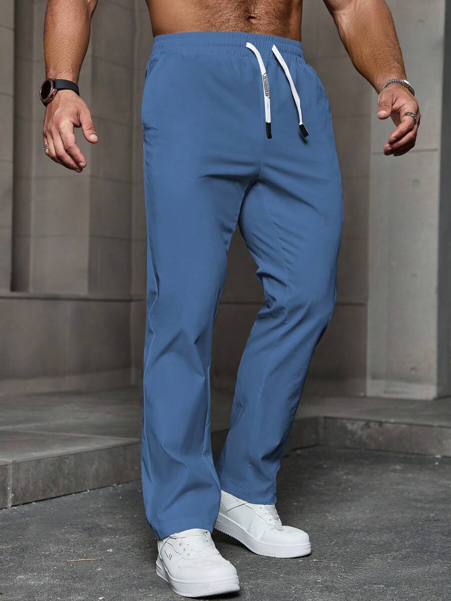 Manfinity Homme Pantalones casuales de verano para hombres de unicolor, con cintura elástica, cordón y bolsillos