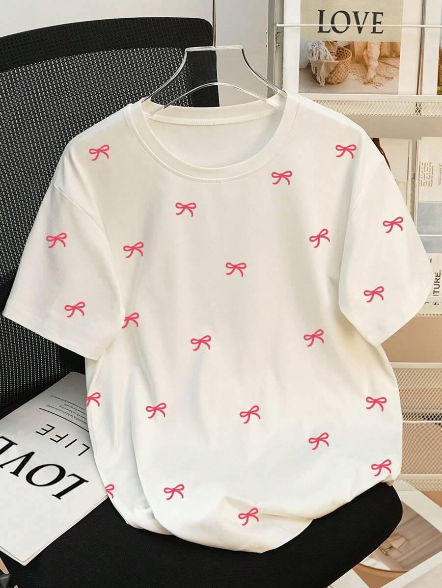 SHEIN Camiseta casual de mujer de cuello redondo y manga corta con estampado de moño