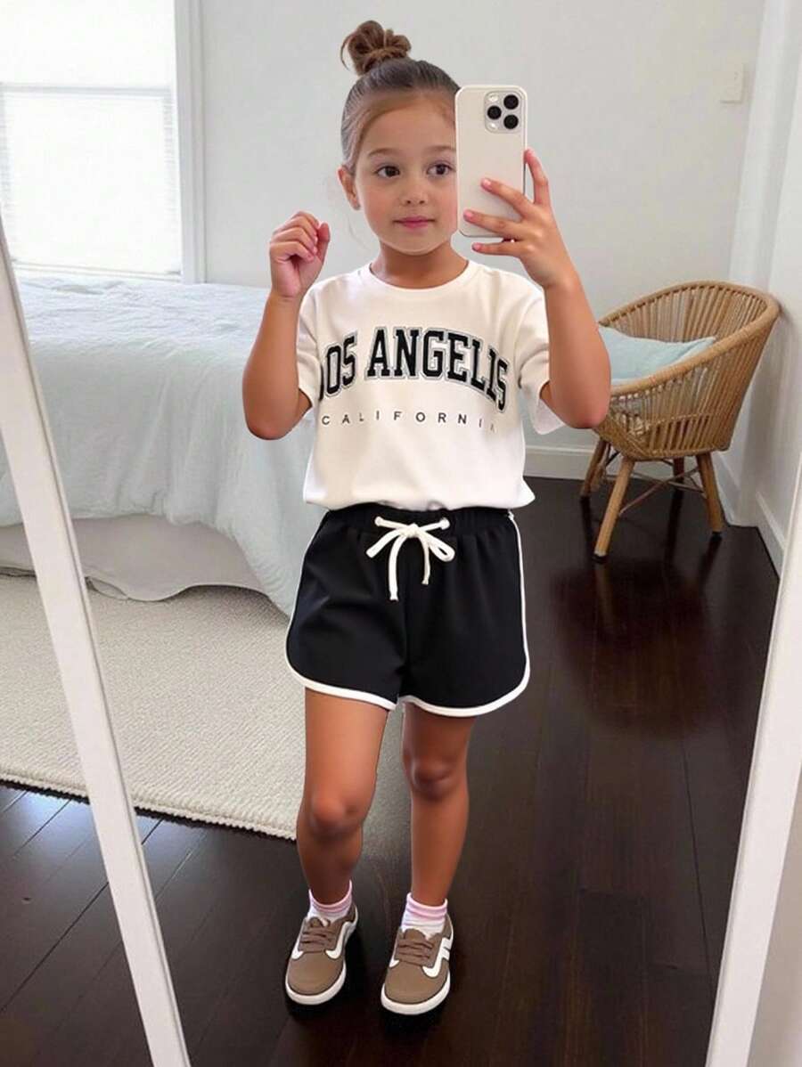SHEIN Top gráfico de letra y shorts con diseño de delfín para niñas jóvenes
