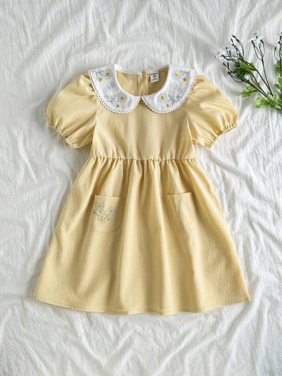 SHEIN Vintaside Kids Vestido corto de niña de color amarillo intenso, con diseño de cuello Peter Pan, dulce y llamativo, con decoración bordada de flores que agrega estilo, corte ajustado simple que resalta la vibrantecortesía, adecuado para juegos al aire libre, uso en casa, actividades deportivas, fiestas de cumpleaños y otras ocasiones