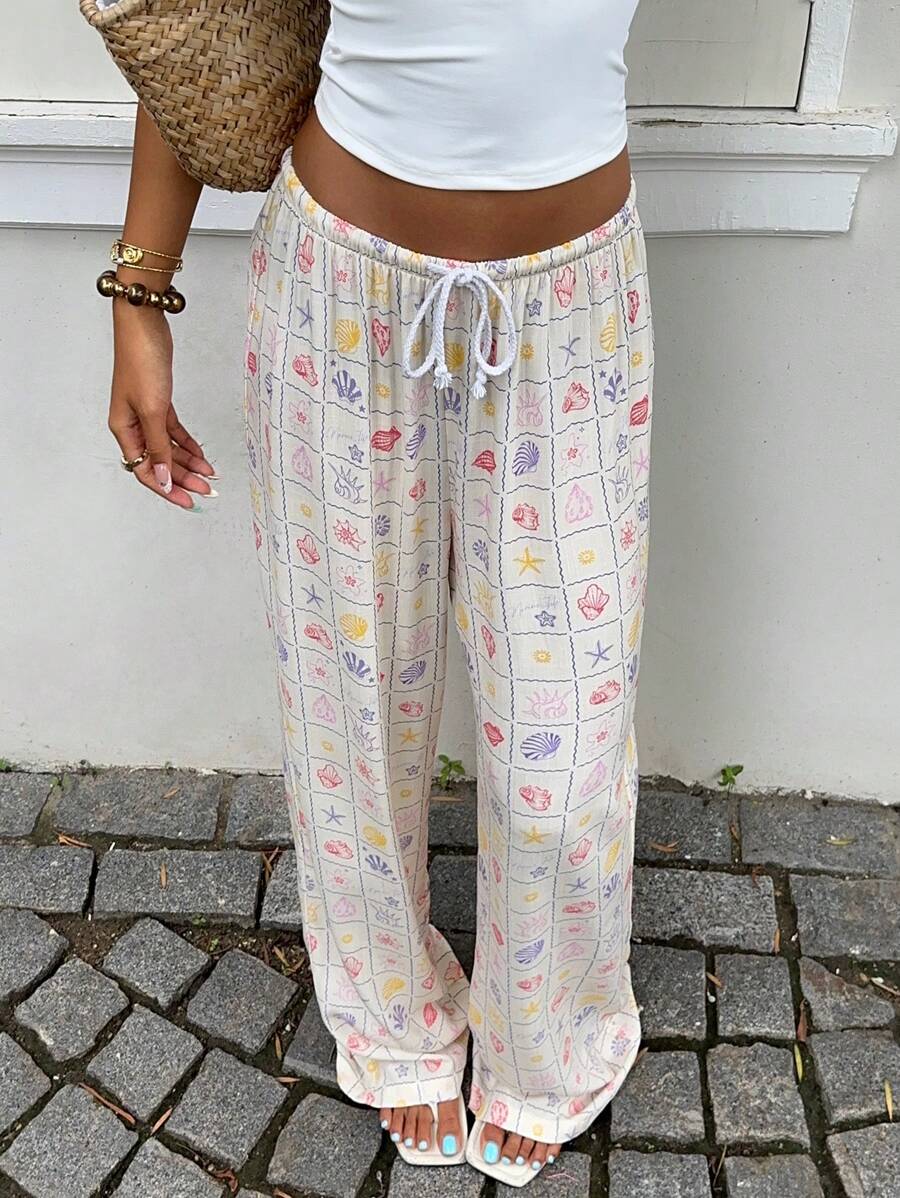 SHEIN EZwear Pantalon ample casual imprimé tout-sur-tout pour femmes