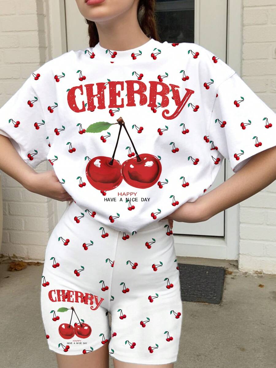 SHEIN Conjunto de 2 piezas vintage con camiseta de manga corta holgada y pantalones cortos con estampado minimista de cerezas, ideal para adolescentes en verano o viaje de primavera