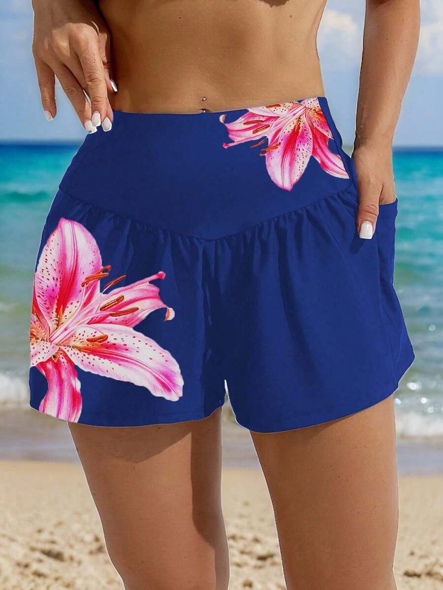 SHEIN Swim Pantaloncini da spiaggia ampi con stampa di fiori di giglio, con tasche, adatti per le vacanze estive