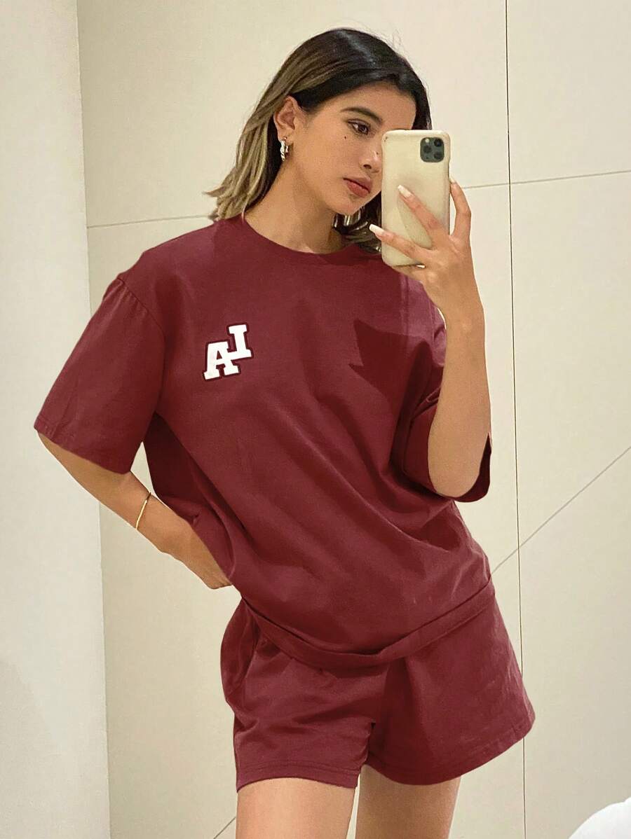 DAZY Set de pijama de 2 piezas con camiseta de manga corta con estampado de letras y shorts para hombre, ropa de estar por casa de corte holgado