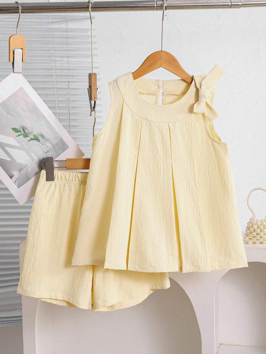 SHEIN 2pcs/Set Girls' Apricot Color Pleated A-Line Bowknot Vest Top & Loose Shorts, Elegant Outfit For Daily Wear & Vacation, Summer