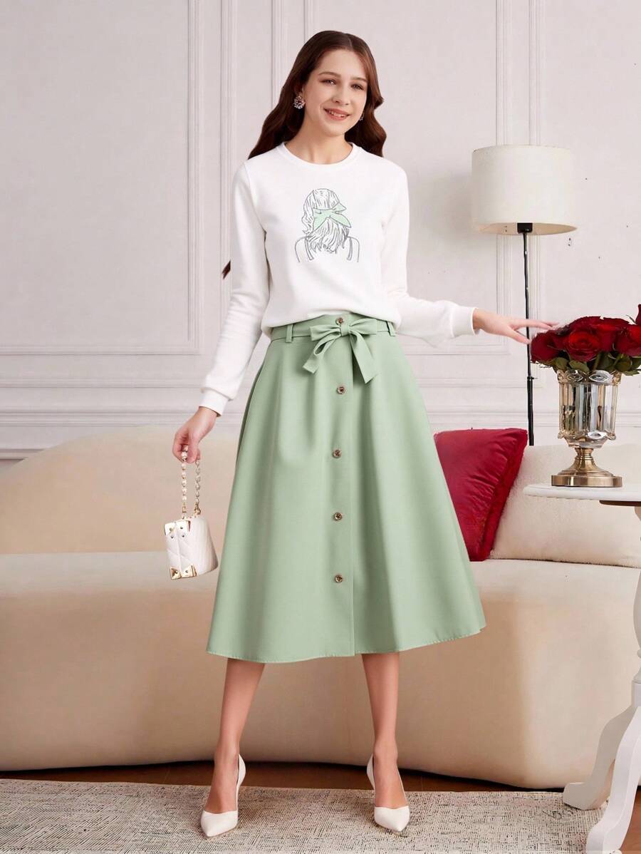 Teen Girl Figure Graphic Pullover & Belted Skirt