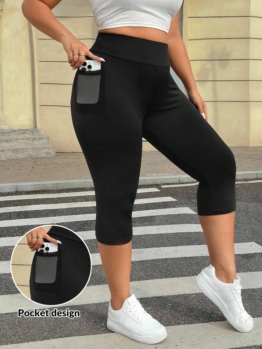 SHEIN EZwear Mallas capri de talla grande de color liso con bolsillo lateral y cintura alta