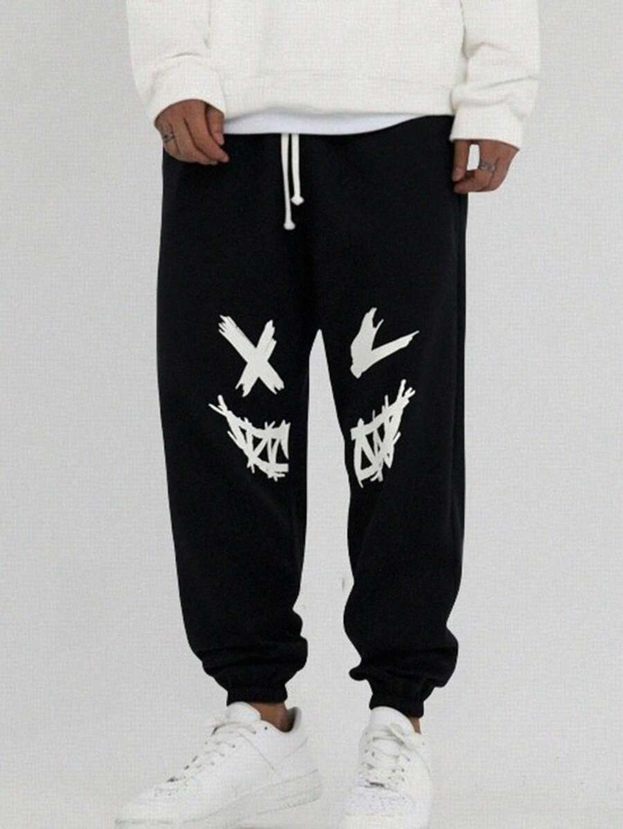 SHEIN Pantaloni de trening negri imprimați cu model de desene animate pentru adolescenți, colegii casual, comozi și la modă, versatil, țesătură moale, potriviti pentru uzura zilnică, școală, călătorii, sporturi în aer liber, primăvară/vară