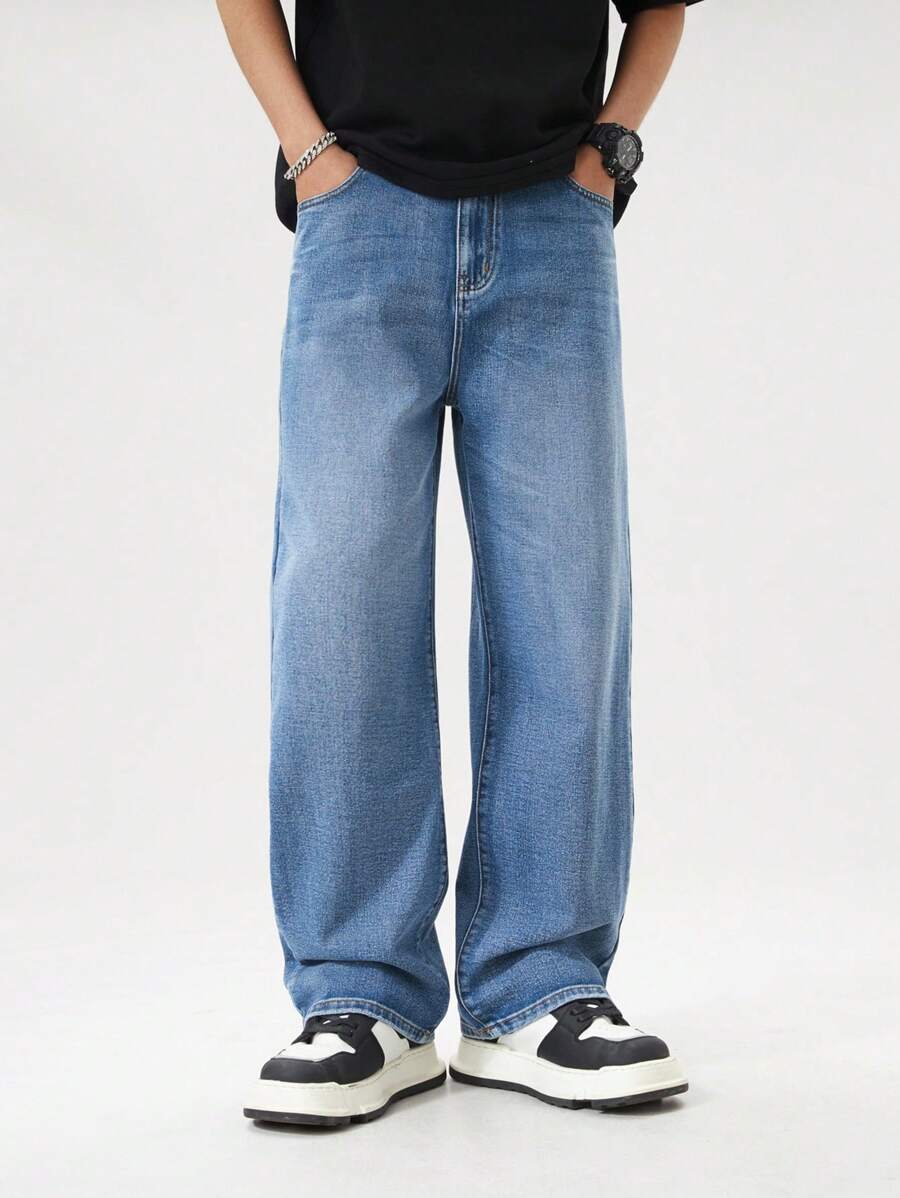SHEIN Jeans casual e versatili per ragazzi adolescenti, capo di moda semplice e comodo, pantaloni in denim con gamba ampia e vestibilità comoda, lavaggio dell'acqua, effetto slavato e strappato, colore nero