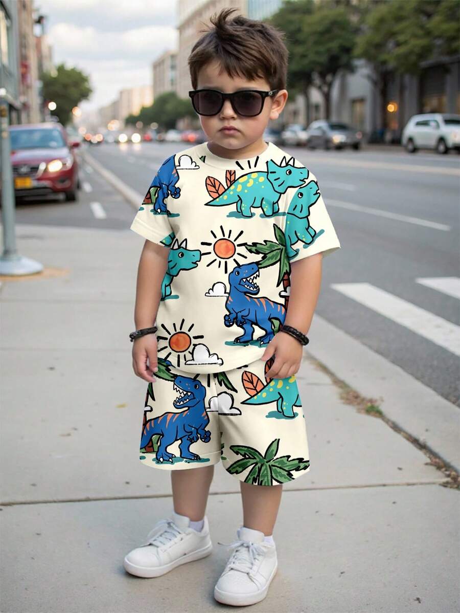 SHEIN Set de 2 piezas de camiseta de manga corta de cuello redondo con estampado de dibujos animados y pantalones cortos casual para niños, verano