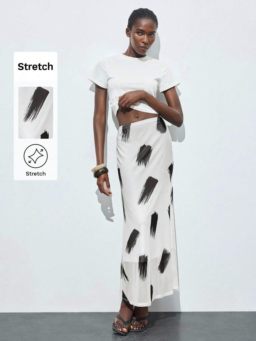 Maija Gonna elegante estiva da donna, in bianco con stampa nera, vita elastica, orlo spacco, stile minimalista, adatta per l'ufficio
