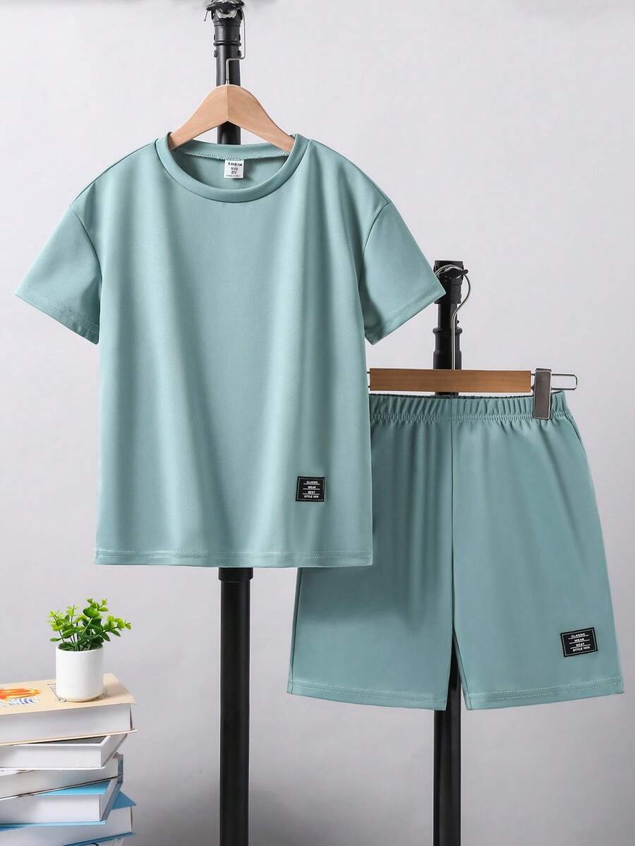 SHEIN Conjunto de Camiseta de Manga Curta com Gola Careca e Shorts Estampados Casuais para Meninos Pré-Adolescentes