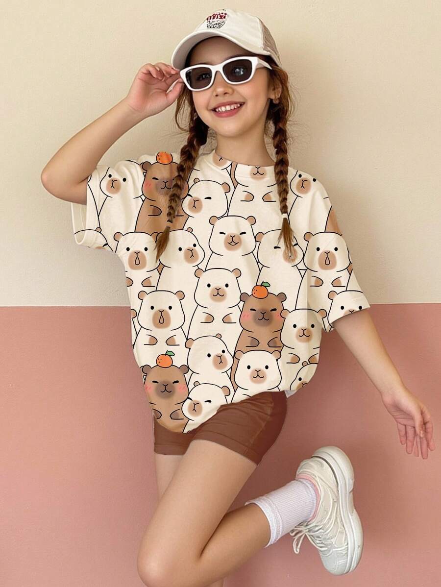SHEIN Set de 2 piezas de camiseta de manga corta y pantalones cortos informales y holgados para niñas preadolescentes, con diseño lindo de carpincho, color meleagris, apropiado para el verano