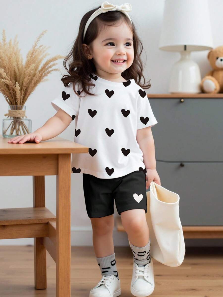 SHEIN Set da 2 pezzi casual per bambine composto da maglietta a girocollo a maniche corte con stampa a cuori dipinta a mano e leggings, adatto per primavera/estate