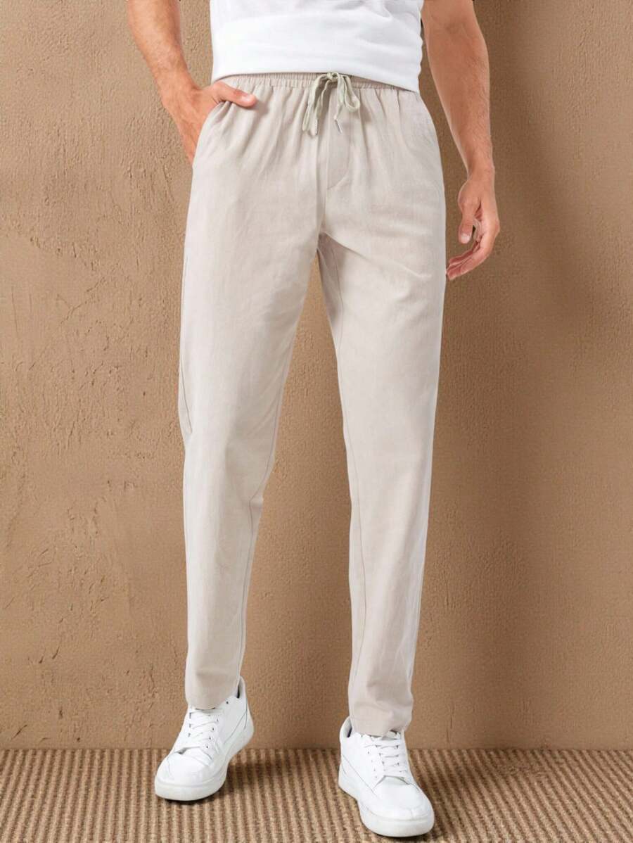 HIMLAND Pantaloni lunghi e affusolati in cotone da uomo con coulisse in vita, tasca con toppa, in lino khaki semplice da marito per uscire