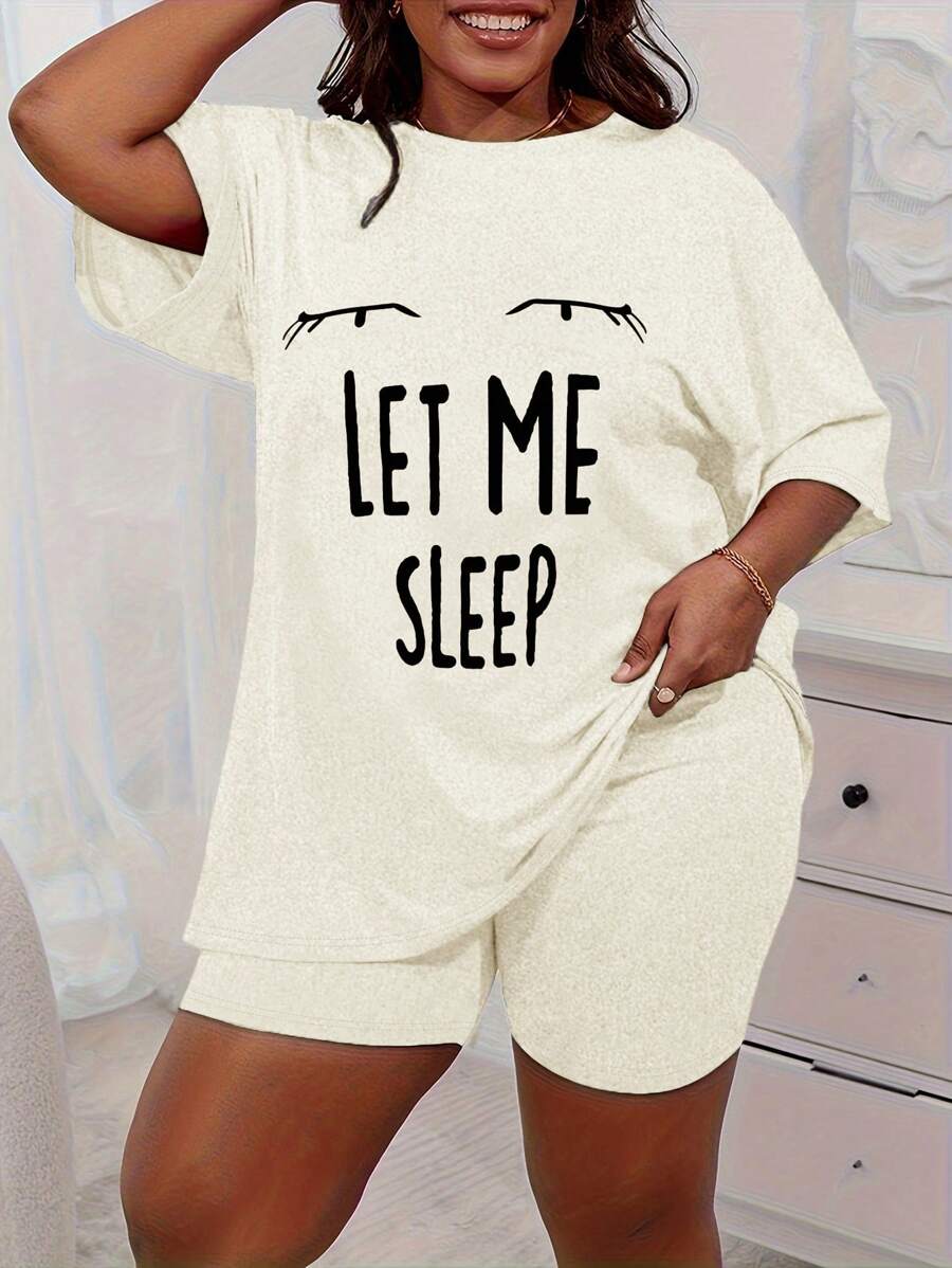 Conjunto casual de talla grande, compuesto por una camiseta de cuello redondo de corte holgado con estampado de ojo y eslogan, y shorts/pantalones, adecuado para exteriores, viajes y estar en casa en primavera y verano