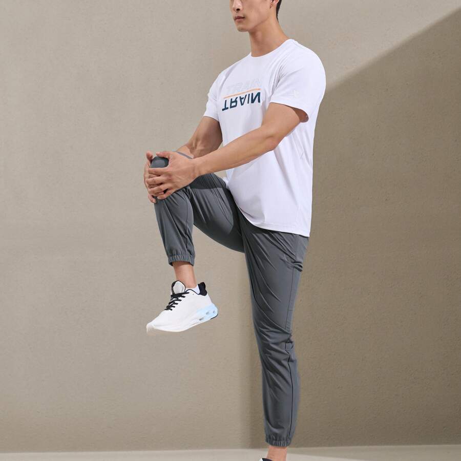 XTEP Athletic Pants For Men, Spring/Fall 2025 Official Quick-Dry Breathable Woven Athletic Pants, Casual Training Gym Pants. 876229980205