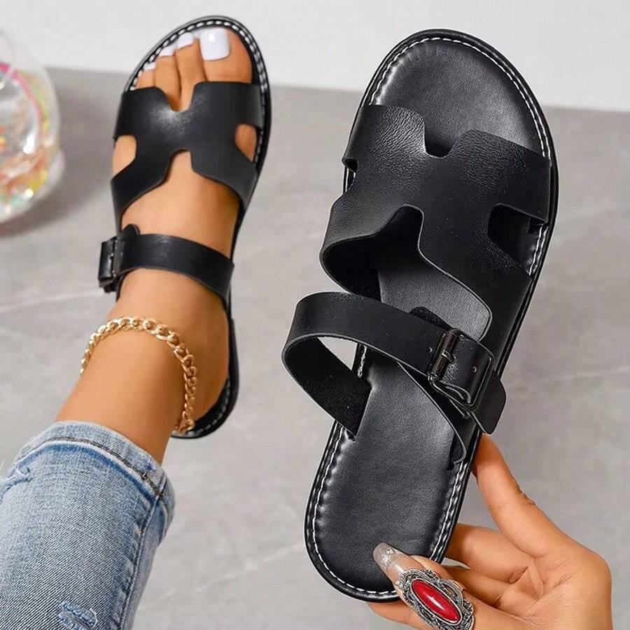 Sandales plates pour femmes, chaussures d'été confortables avec un design d'orteil ouvert et des brides réglables, convenant aux sorties décontractées et aux journées à la plage, légères et respirantes pour un port quotidien