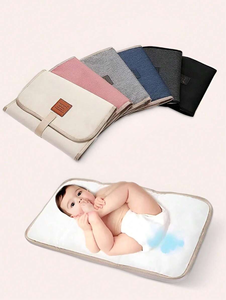 1 pieza Almohadilla portátil y resistente al agua para cambiar pañales, tamaño pequeño 23*12 pulgadas, adecuada para bebés de 0 a 12 meses, esterilla de cambio de pañales plegable para viajes, disponible en varios colores para niños y niñas