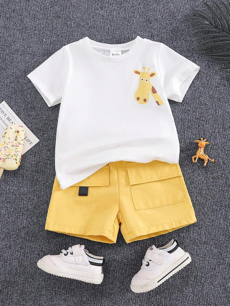 Set de 2 piezas de camiseta de cuello redondo y pantalones cortos casuales de niño pequeño con estampado de jirafa de dibujos animados, para verano