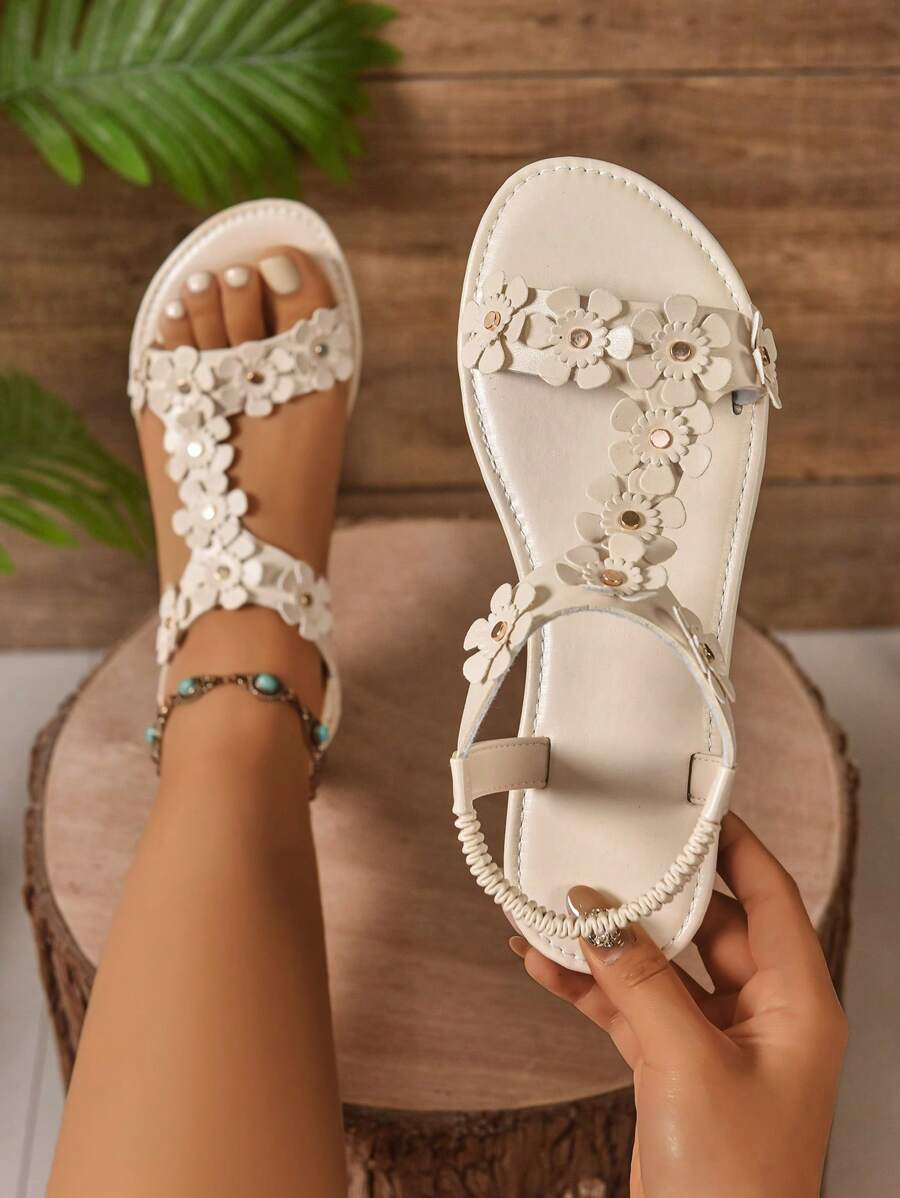 Sandales plates larges pour femmes, sandales élégantes de mode pour dames avec décoration florale , polyvalentes pour fête, port casual en extérieur