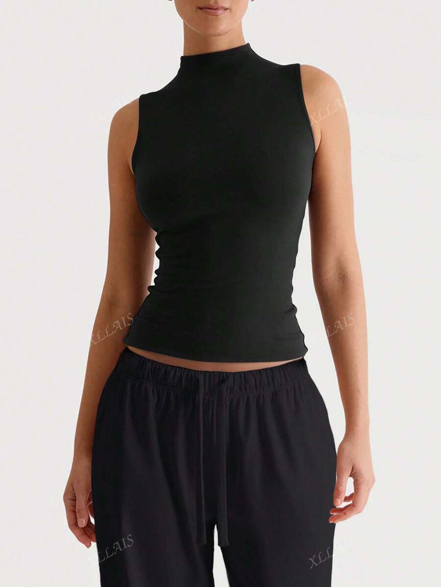 Camiseta básica de ajuste ceñido con doble capa, sin mangas y de cuello medio en color sólido, de la marca XLLAIS