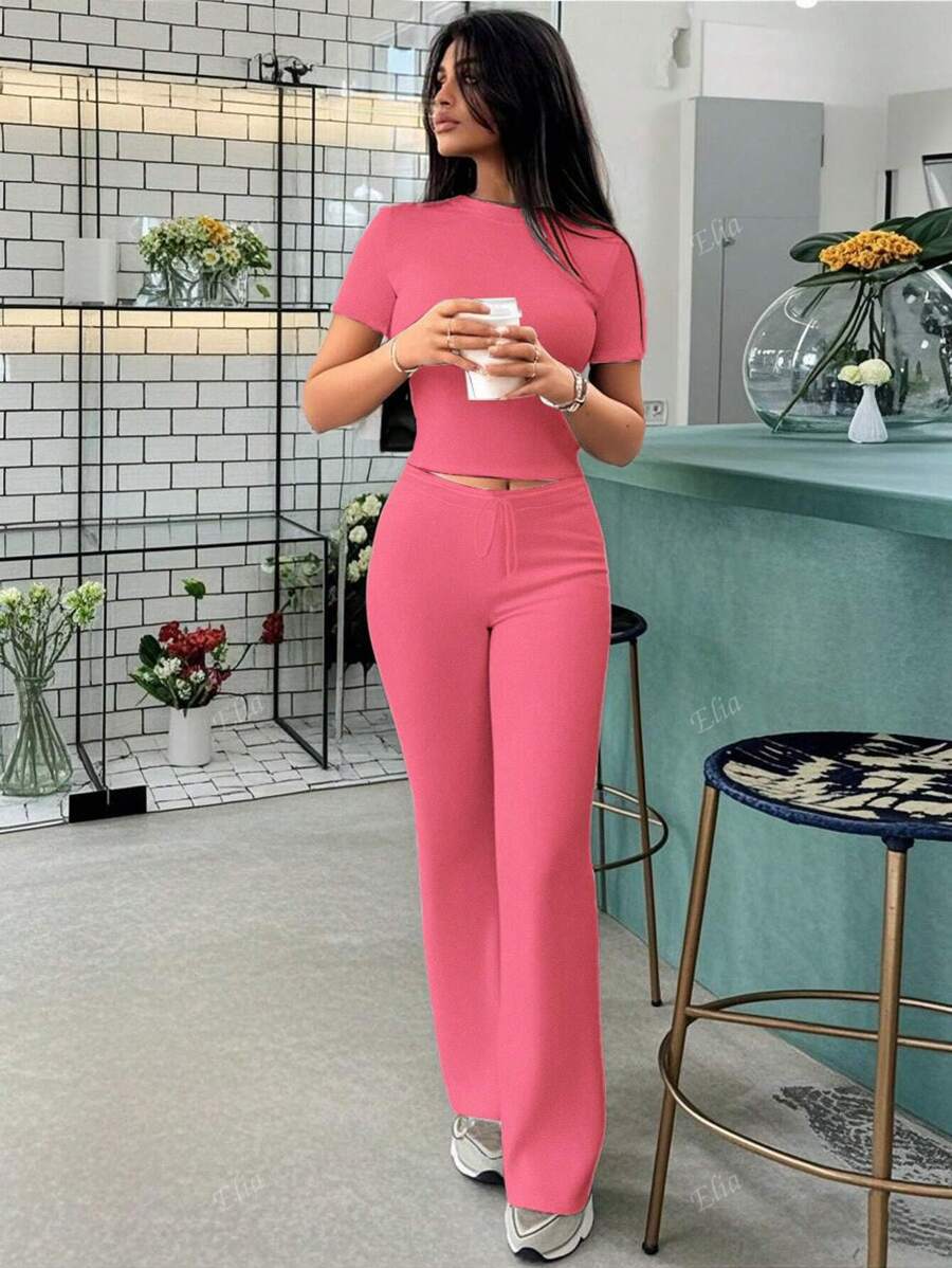Spring Women's Fashionable Belly-Baring Short-Sleeved Tops, Slim-Fitting Lace-Up Flared Pants Sports Suit