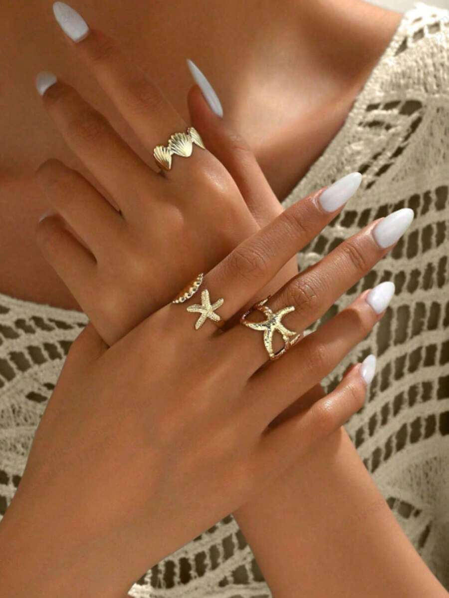 Set de 3 anillos ajustables con diseños metálicos de la serie del océano, incluyendo estrellas de mar y conchas en 3D