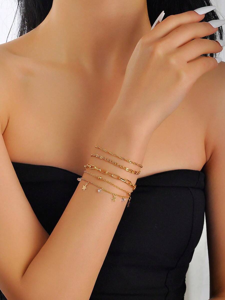 Set de 4 piezas de pulseras con diseño de cadena de capas con dijes de estrella de moda para mujeres, adecuado para joyas y accesorios de todas las estaciones