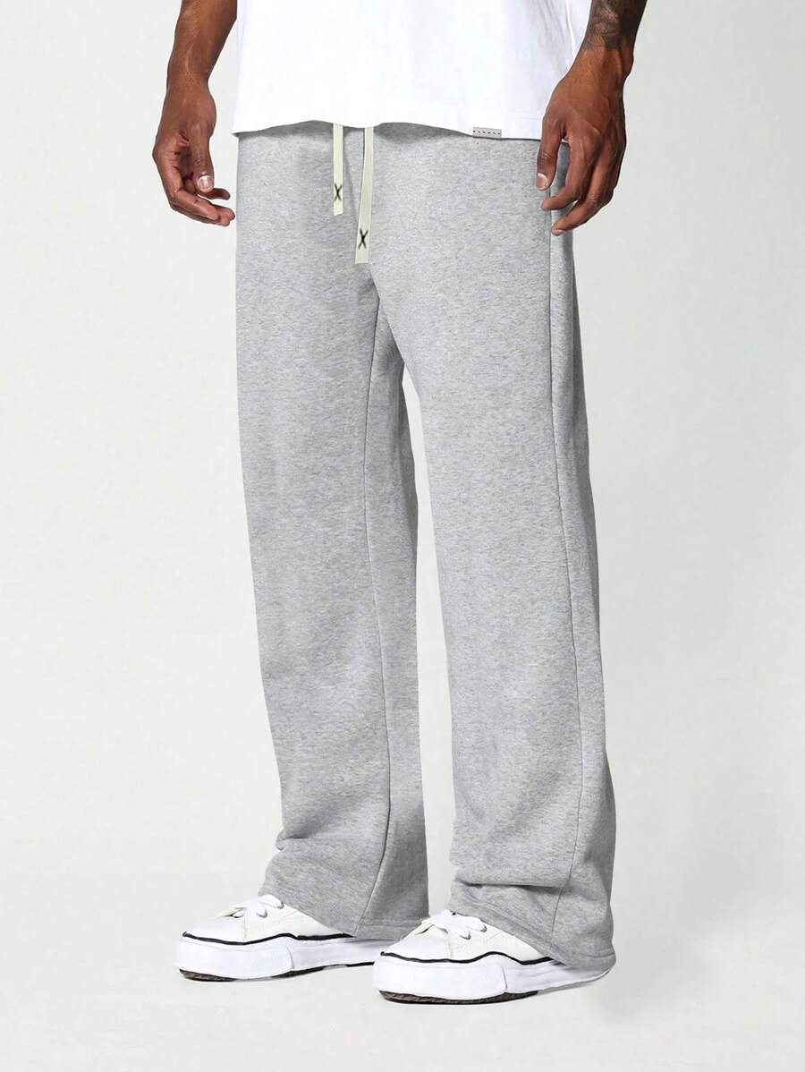 Pantalon casual ample à jambes droites pour hommes, pantalon large à cordon de serrage de couleur unie, simple et , polyvalent