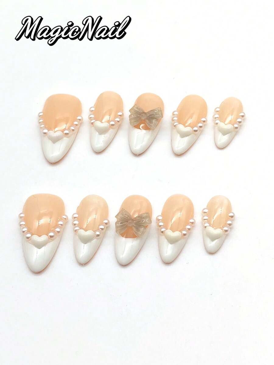 10 Pieces Of Pure Hand-Pressed Wearable Nail, Press On Nails,Nail Supplies,Nails Ptess On,Beach Essentials,25mm Almond Shape, Pink White And White Contrast Color, White Small Pearl And White Heart Shape To Form A Necklace Shape, 3D Bow Ornaments. Spring And Summer Style, Ballet Style. It Is Suitable For Daily Leisure Vacations, And Can Be Worn When Attending Dances, Banquets, Parties And Other Activities.