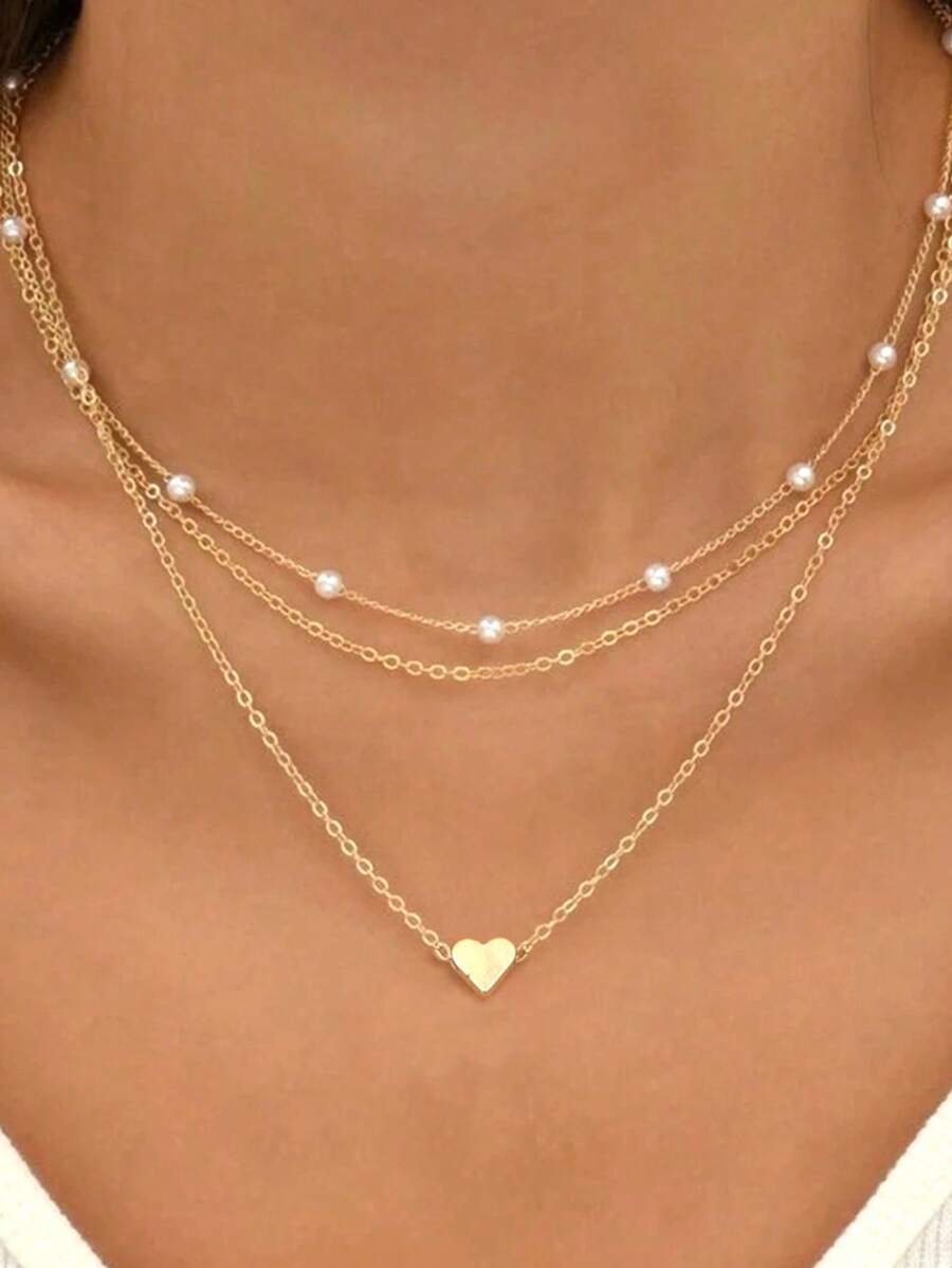 Collier pendentif en métal à chaîne, faux perle et cœur, dans le style de la mode européenne et américaine. Ras-du-cou élégant et rétro, polyvalent, convenant pour un port quotidien, cadeau pour les enseignants ou pour la remise des diplômes
