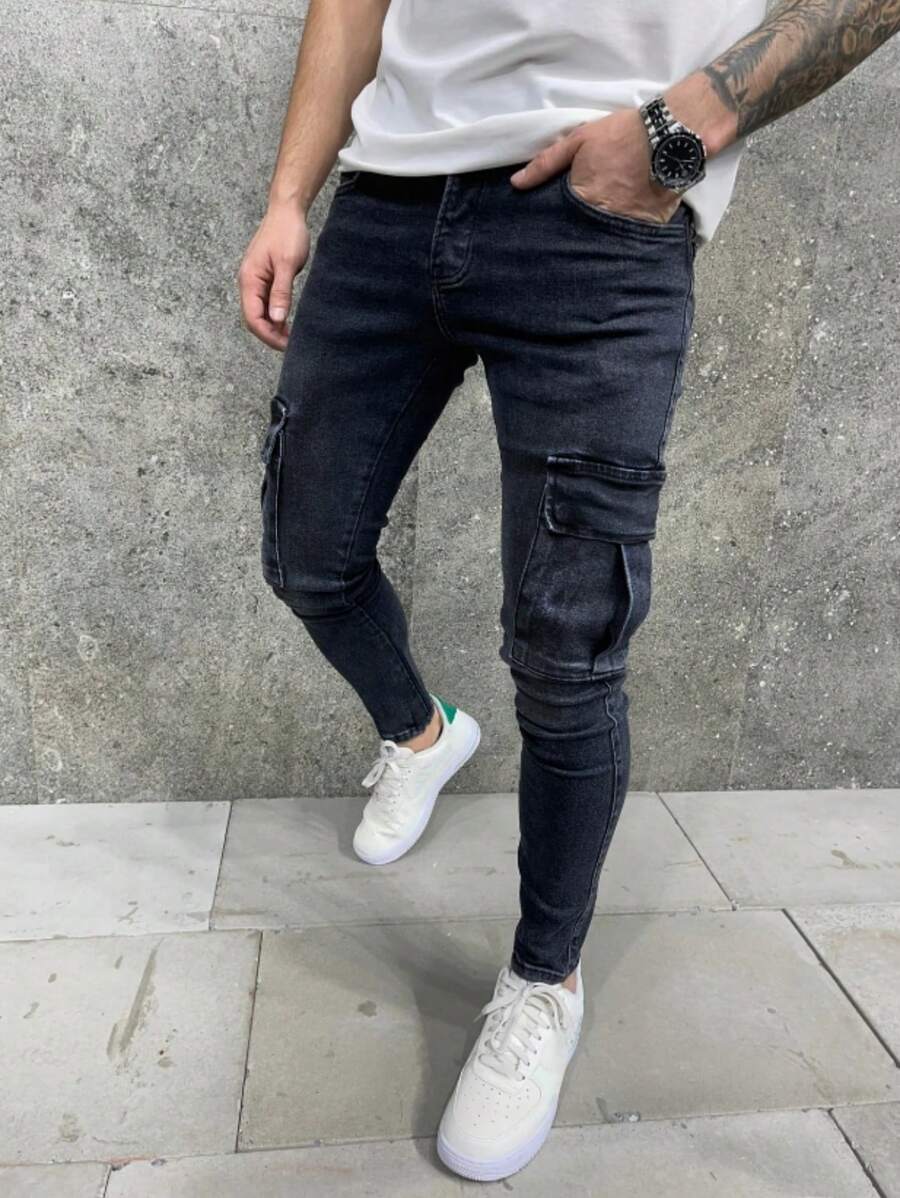 Jeans negros lavados de corte skinny y elástico de unicolor para hombre