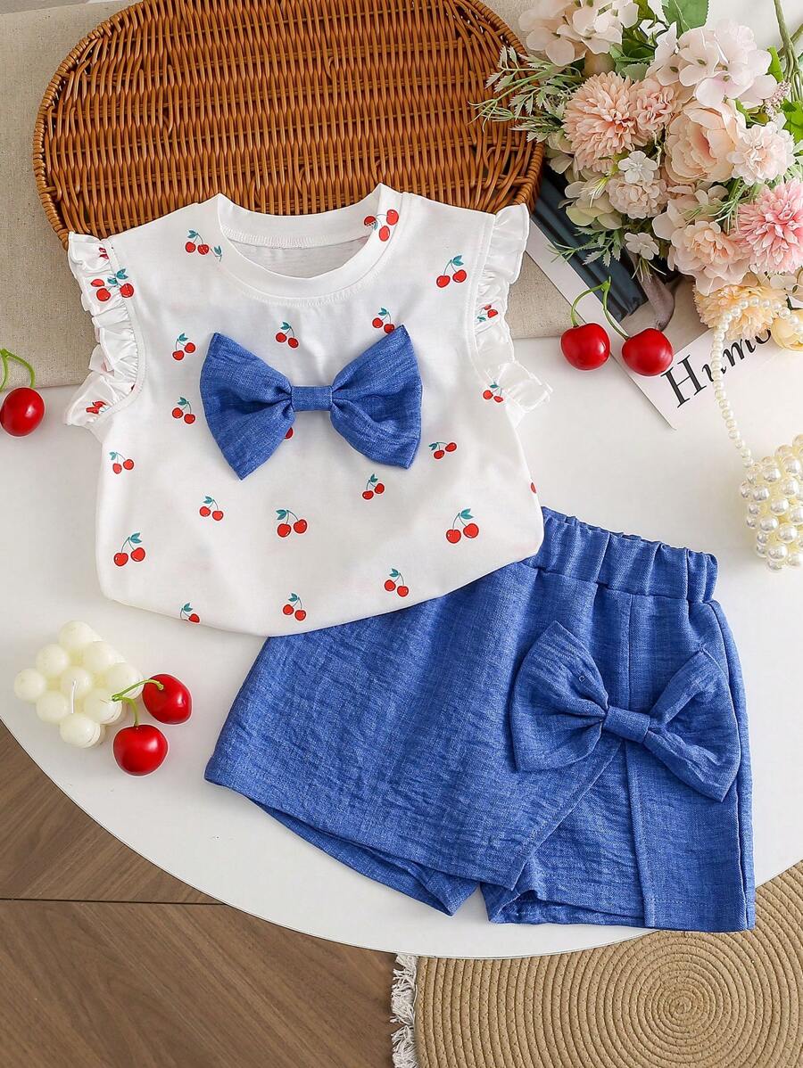 Conjunto de 2 piezas de top informal con estampado de cerezas y lazo, talla grande shorts azul denim para niñas