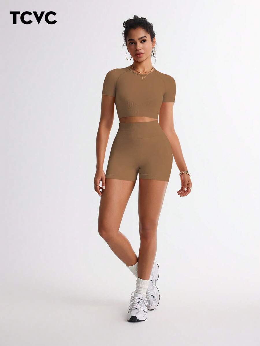TCVC Set attivo da donna senza cuciture di colore unito altamente elastico e trasparente, top a girocollo a maniche corte aderente + pantaloncini a vita alta snellenti di colore unito per i fianchi, adatto per corsa, yoga, palestra, attività all'aperto, tempo libero