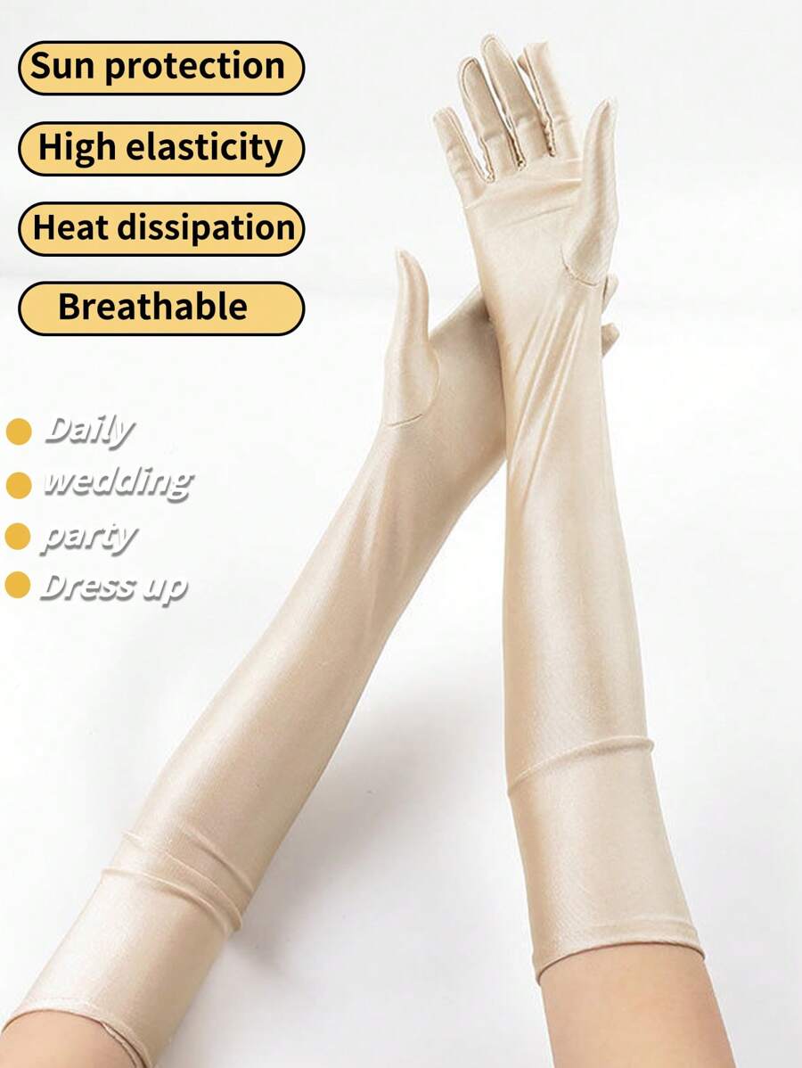 Manches de bras pour fêtes, mariages, événements et rassemblements. Gants de cyclisme et de conduite longue style haute élasticité en spandex pour femme, avec protection solaire. Le tissu est respirant, agréable pour la peau et résistant à l'effilochage.
