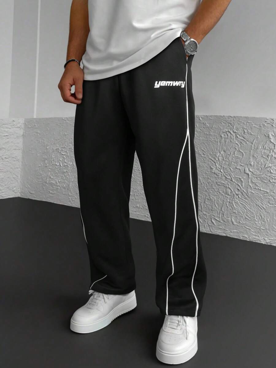 Yemwry Pantalones de pierna ancha, sueltos y con cordón en la cintura con diseño de contraste y letras impresas para hombre