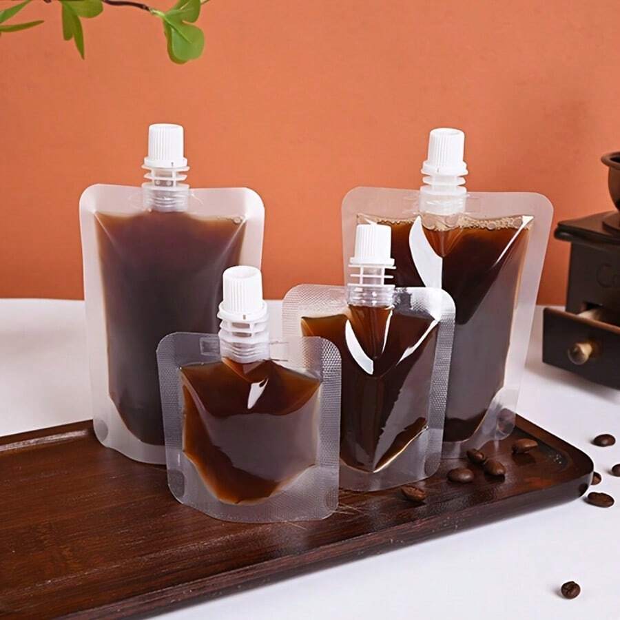 50 Stücke Einweg-Kaffee-Flüssigkeitsverpackungsbeutel, tragbare Getränkebeutel, Safttüten, vertikale Getränkebehälter für kalte und heiße Getränke, durchsichtige Saugdüsenbeutel, lebensmittelecht, auslaufsicher, hochwertige Einwegartikel