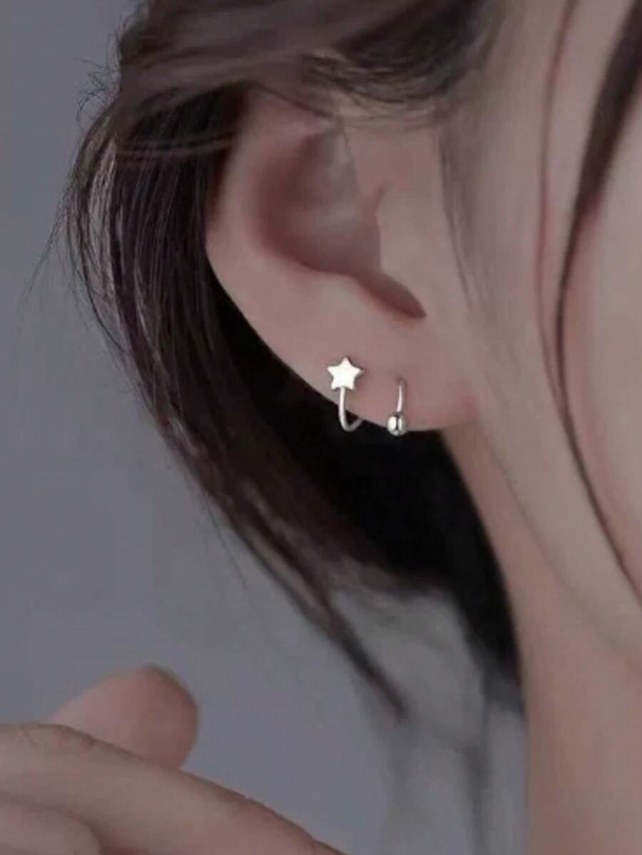 1 paire de clips d'oreilles en forme de cœur à ressort