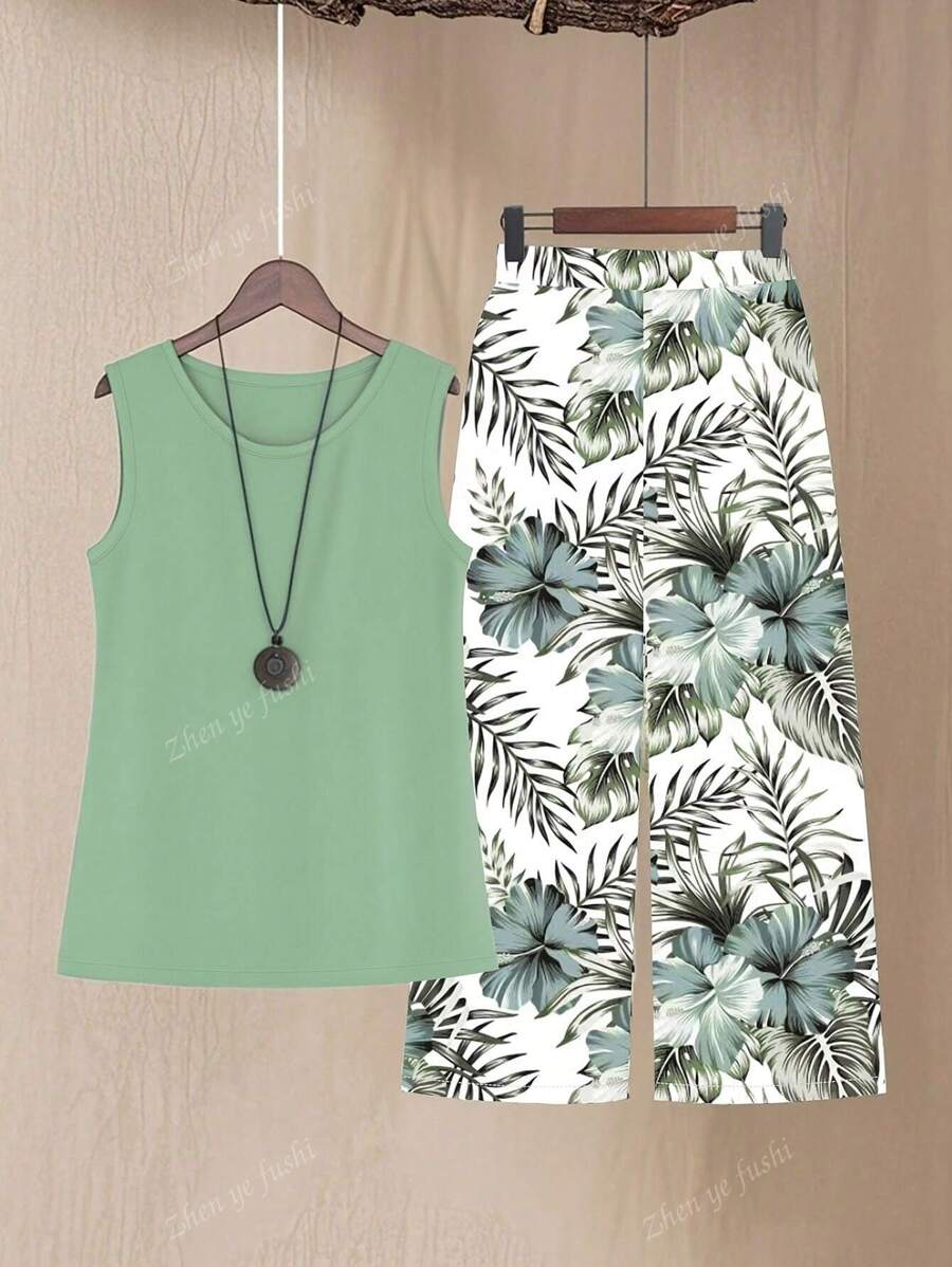 Set de 2 piezas para vacaciones: Camisa de tirantes de unicolor de cuello redondo y pantalones anchos con estampado de plantas tropicales para mujer